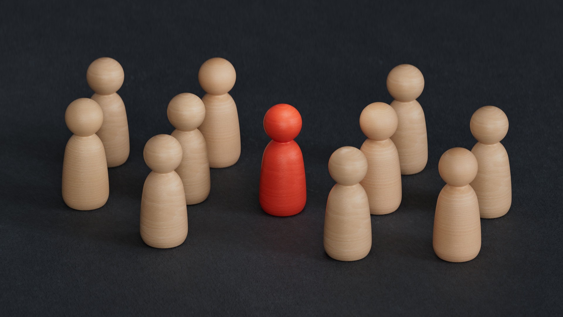 3D illustration of two groups of  pawns and a mediator in the middle. Abstract concept of arbitration between two parties.3D rendering on black background.